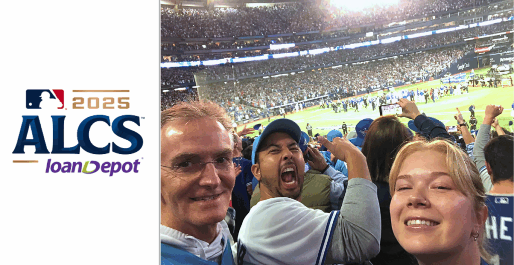 Three smiling Commerce Dynamics (CDi) team members celebrate at Rogers Centre during Game 7 of the 2025 American League Championship Series, surrounded by a packed stadium of Toronto Blue Jays fans. The image captures the excitement of the moment as the Blue Jays clinch their first World Series berth in over 30 years.